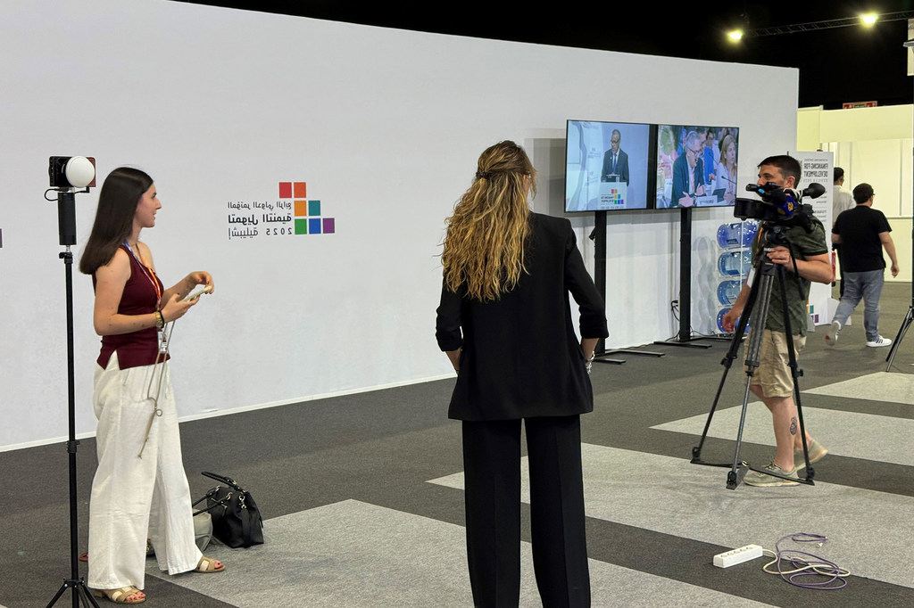 Women journalists working in the press room of the 4th International Conference on Financing for Development which took place in Sevilla, Spain.